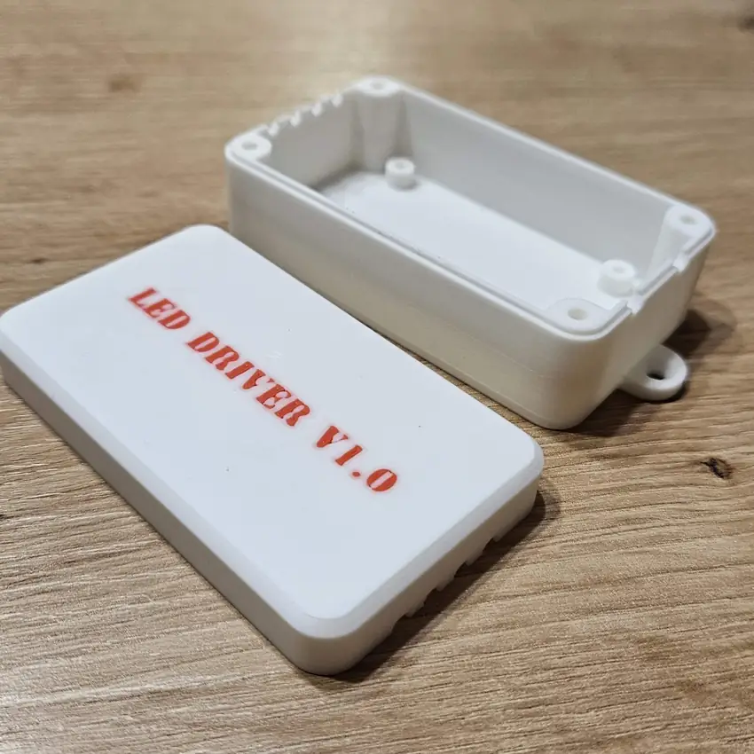 Printed base and cover of a white LED driver enclosure