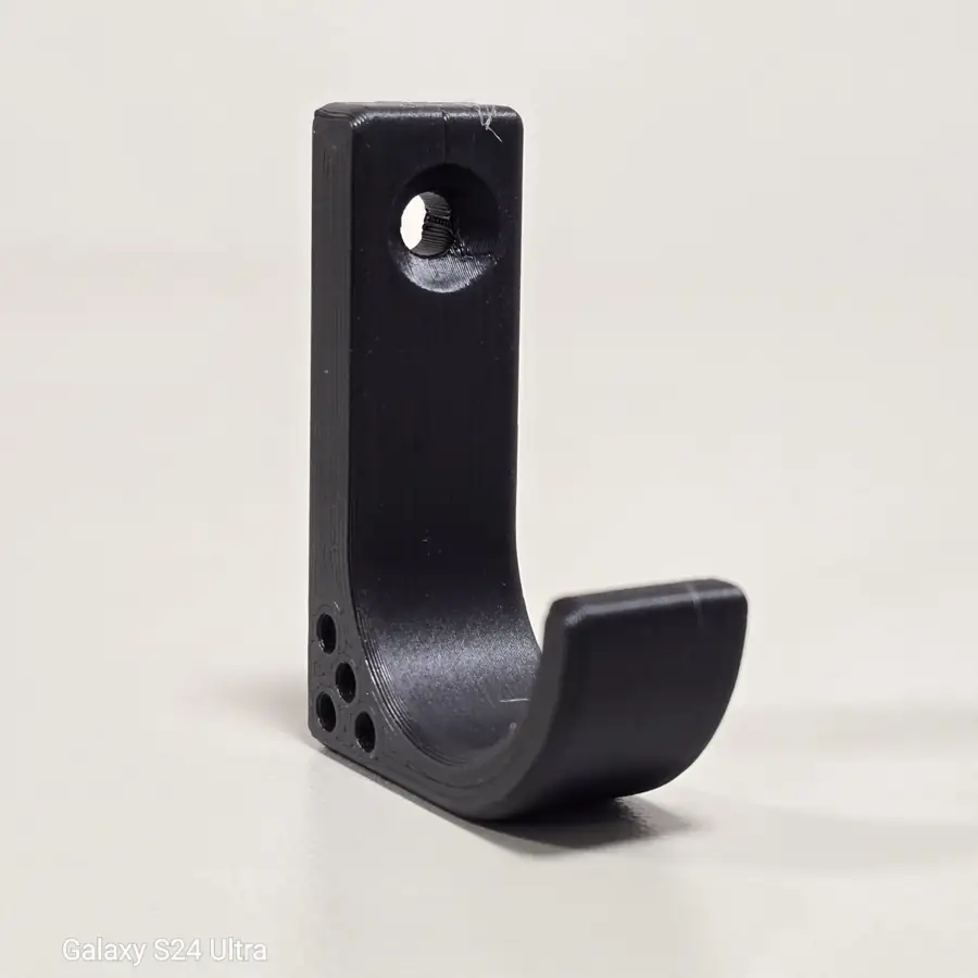 Black 3D printed hook with mounting holes
