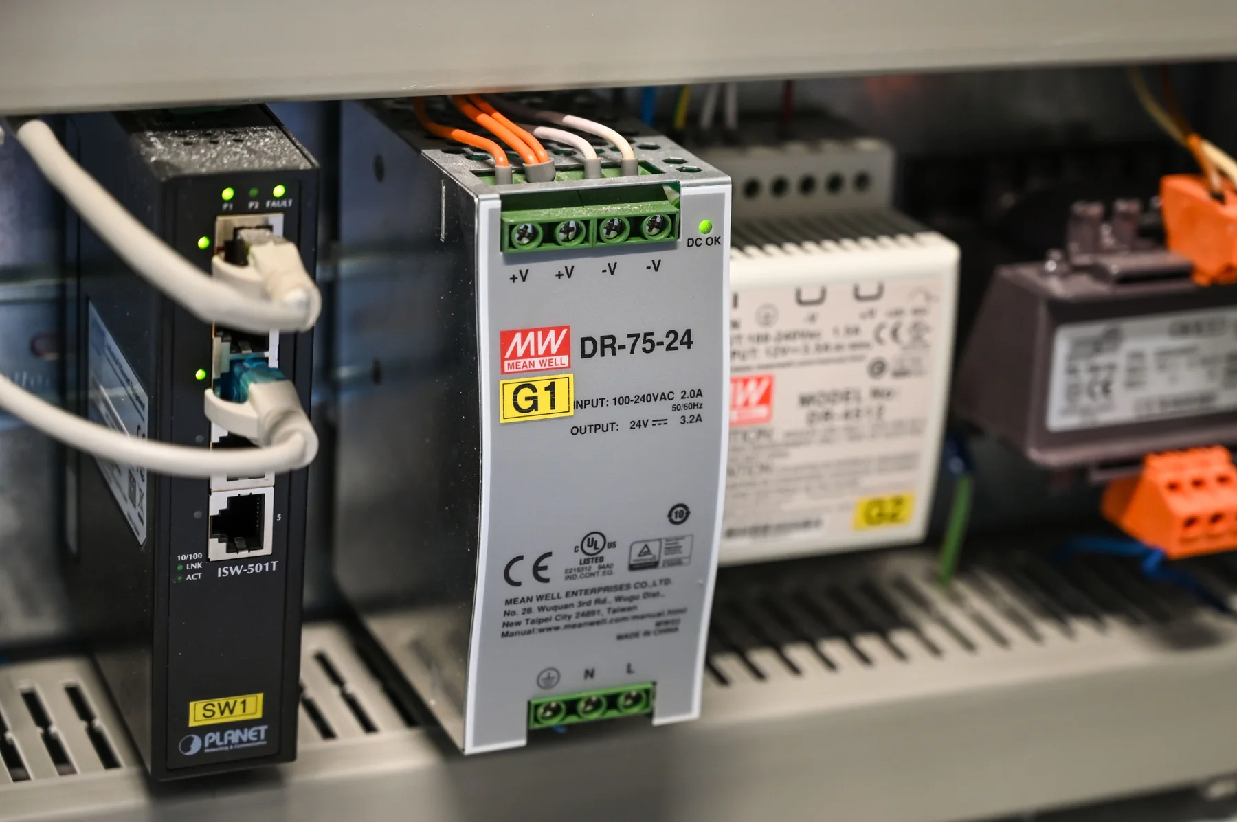 Power module and industrial network switch in an electrical cabinet